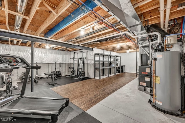 exercise room with heating unit and gas water heater