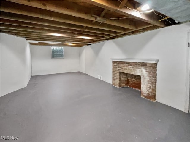 basement featuring a fireplace