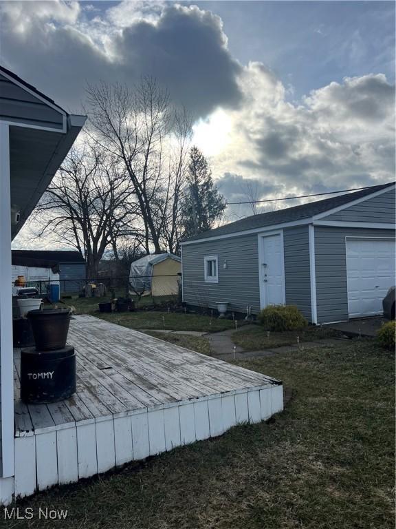 exterior space featuring an outbuilding and a yard