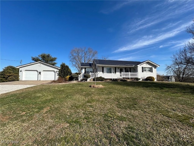 ranch-style house featuring a garage, a front yard, covered porch, and driveway