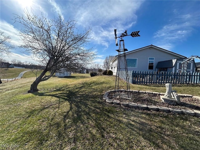 view of yard featuring fence