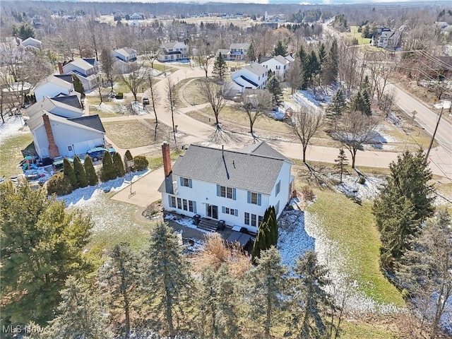 birds eye view of property with a residential view