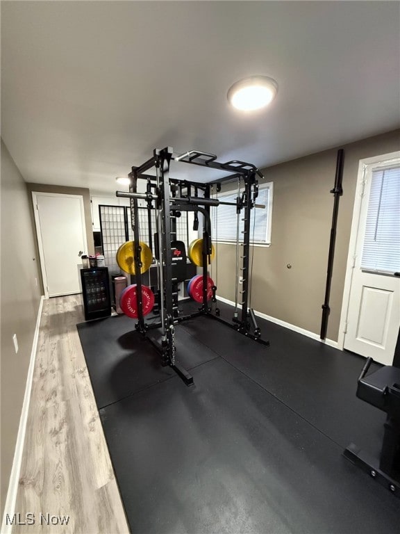 workout area featuring baseboards