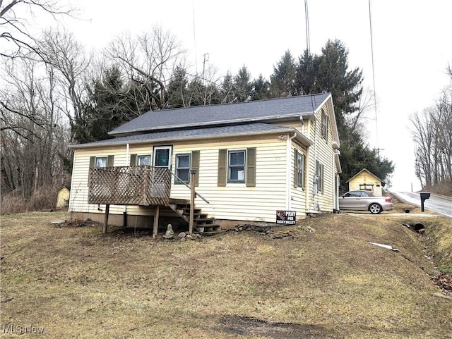 view of front of property with a deck