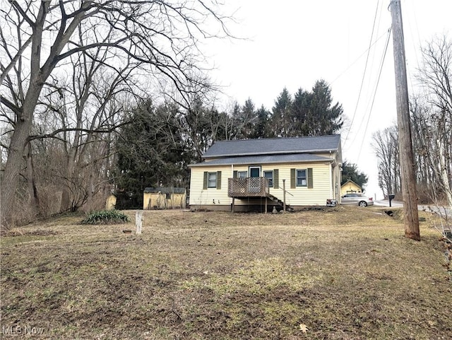 view of front of property with a deck