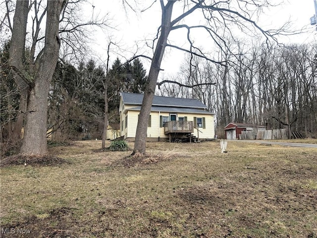 view of front facade featuring a wooden deck