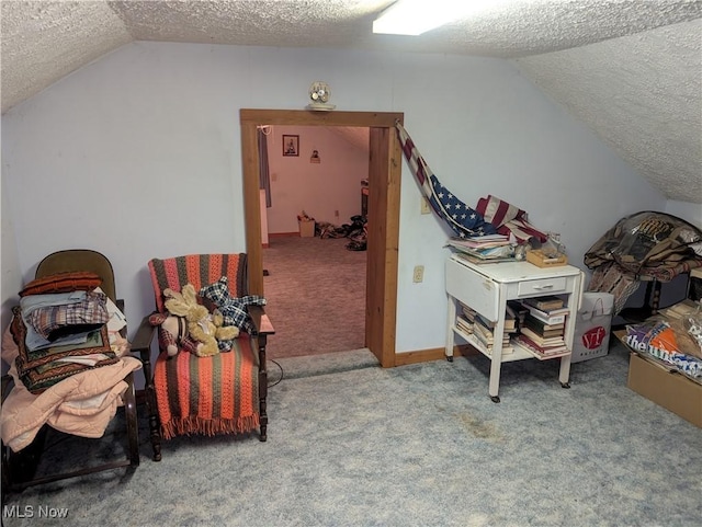 bonus room with lofted ceiling, carpet, and a textured ceiling