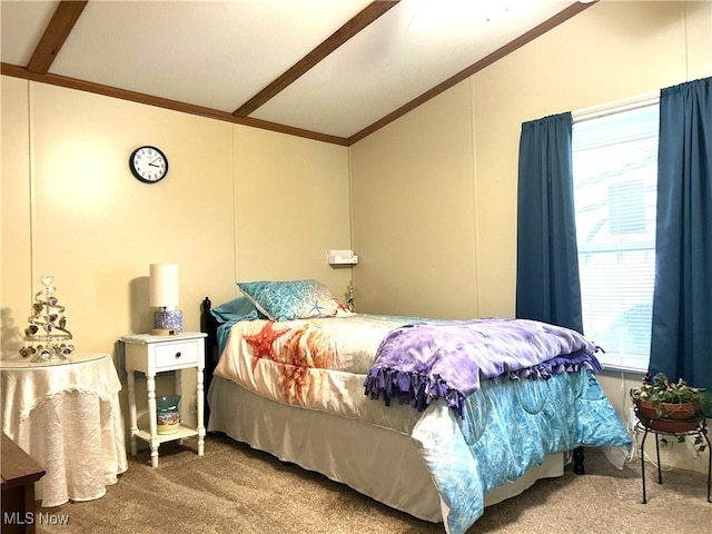 carpeted bedroom with lofted ceiling with beams and ornamental molding