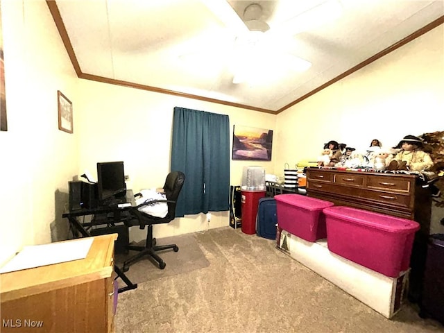 carpeted home office featuring lofted ceiling, ceiling fan, and crown molding