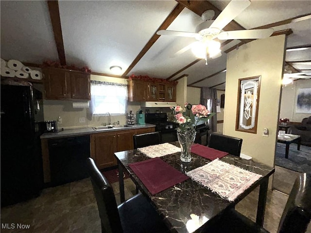 dining space featuring lofted ceiling with beams and ceiling fan