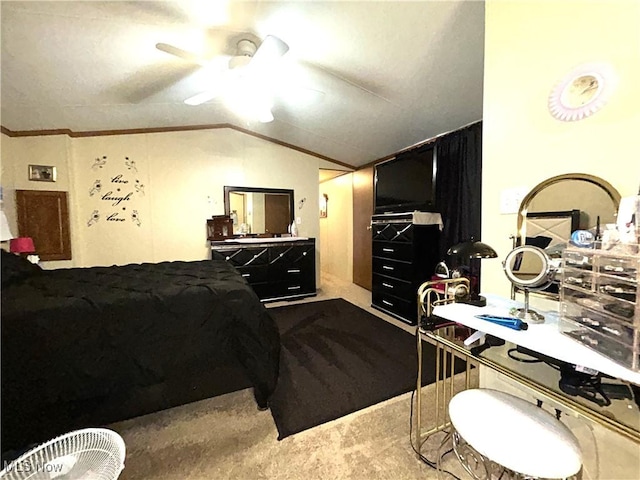 bedroom with a ceiling fan, lofted ceiling, crown molding, and carpet