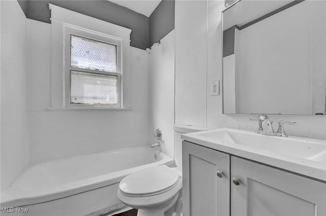 bathroom with shower / bathtub combination, vanity, and toilet