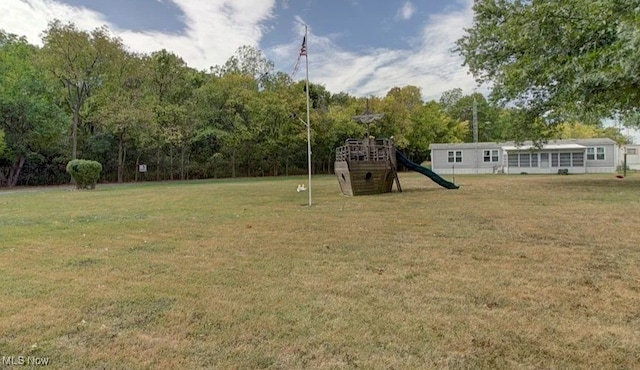 view of yard featuring playground community