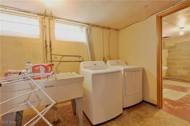 laundry area featuring laundry area and washer and dryer