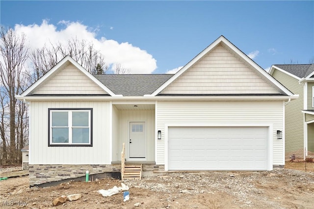 single story home featuring dirt driveway, roof with shingles, an attached garage, and entry steps