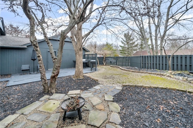 view of yard featuring a fenced backyard and a patio