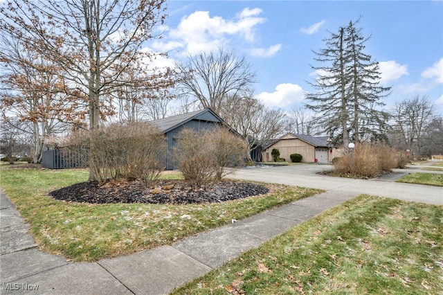 view of home's exterior with a yard