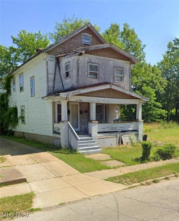 view of front facade featuring covered porch