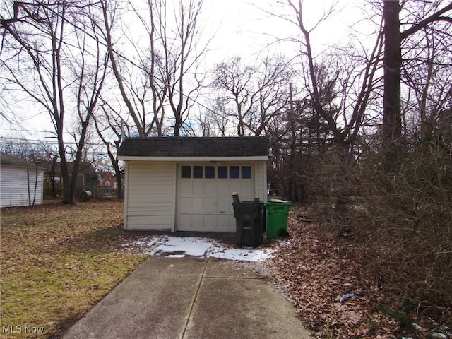 detached garage with driveway