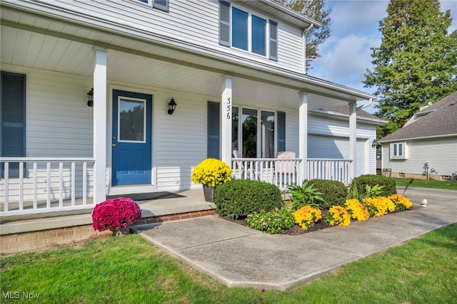 entrance to property with covered porch