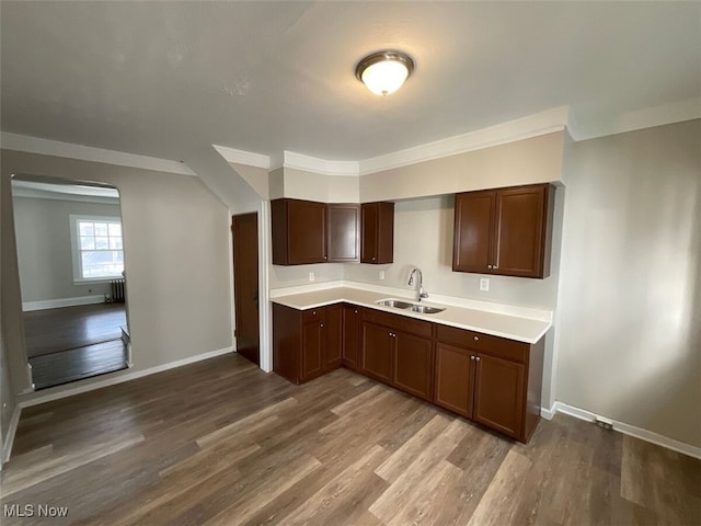 3096 Meadowbrook Blvd, Cleveland Heights, OH 44118 - kitchen with dark wood-style floors, light countertops, a sink, and baseboards