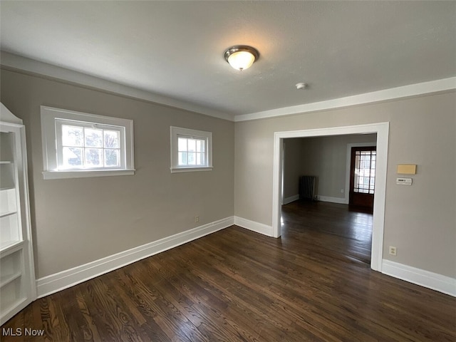 3096 Meadowbrook Blvd, Cleveland Heights, OH 44118 - empty room with dark wood finished floors and baseboards