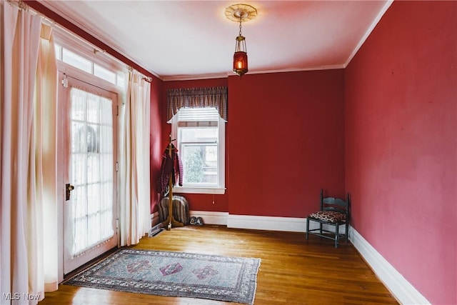 1518 Washington Ave, Parkersburg, WV 26101 - unfurnished room featuring baseboards, wood finished floors, and ornamental molding