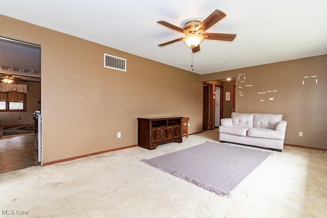 living room featuring light colored carpet, visible vents, ceiling fan, and baseboards