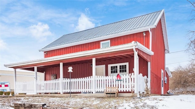 view of front of house with metal roof
