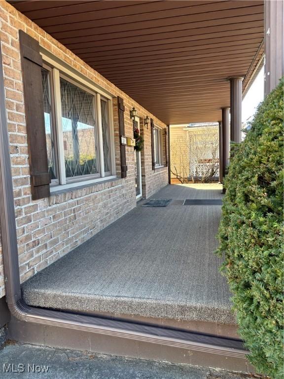 view of patio featuring a porch