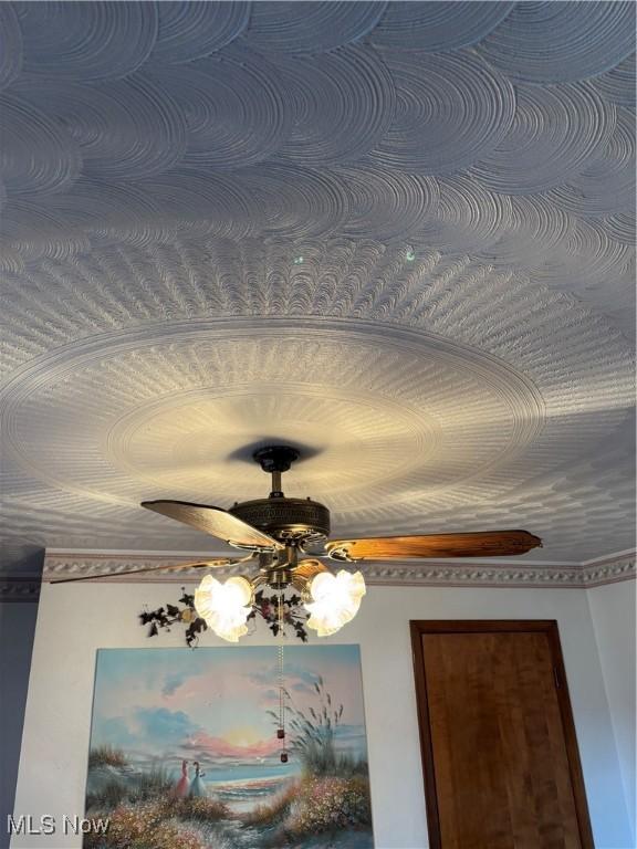 details with a ceiling fan