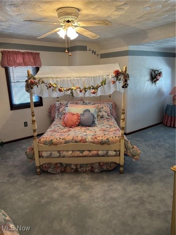 carpeted bedroom with ceiling fan