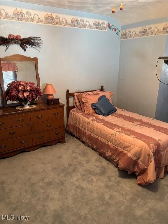 bedroom with light carpet