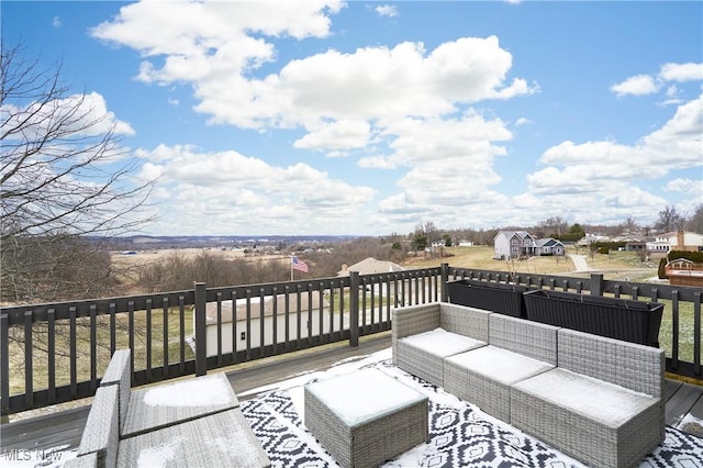 wooden deck featuring an outdoor hangout area