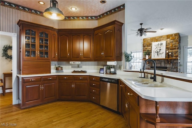 1003 Duncan Ln, Parkersburg, WV 26104 - kitchen featuring a sink, light countertops, light wood-type flooring, and dishwasher