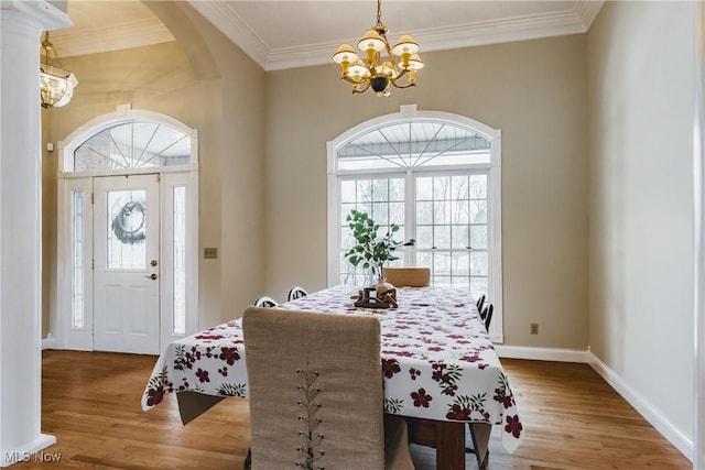 1003 Duncan Ln, Parkersburg, WV 26104 - dining area with an inviting chandelier, plenty of natural light, and wood finished floors
