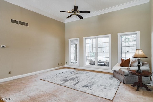 1003 Duncan Ln, Parkersburg, WV 26104 - living area featuring visible vents, crown molding, baseboards, ceiling fan, and carpet