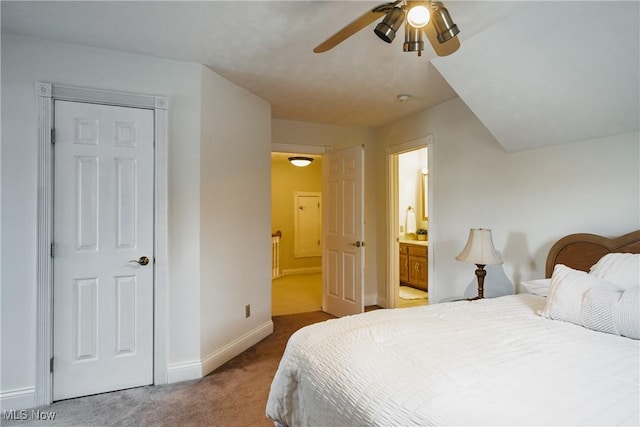 1003 Duncan Ln, Parkersburg, WV 26104 - carpeted bedroom featuring baseboards, ensuite bathroom, and ceiling fan