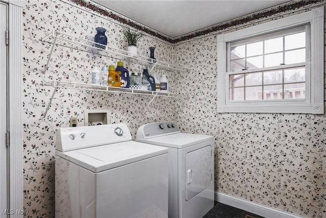 1003 Duncan Ln, Parkersburg, WV 26104 - laundry area featuring laundry area, baseboards, washing machine and dryer, and wallpapered walls