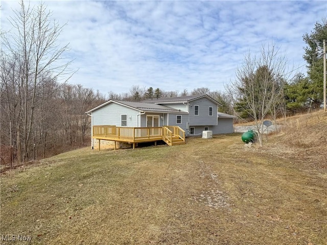 exterior space featuring central AC and a deck