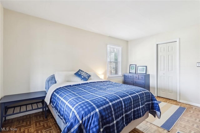 bedroom featuring baseboards