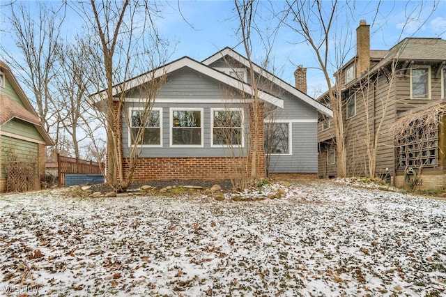 view of front of house with a chimney