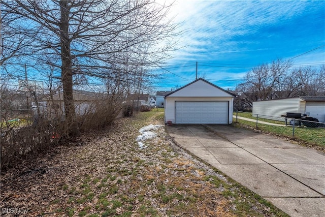 detached garage with fence