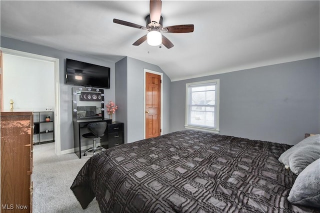 bedroom with lofted ceiling, carpet floors, and ceiling fan