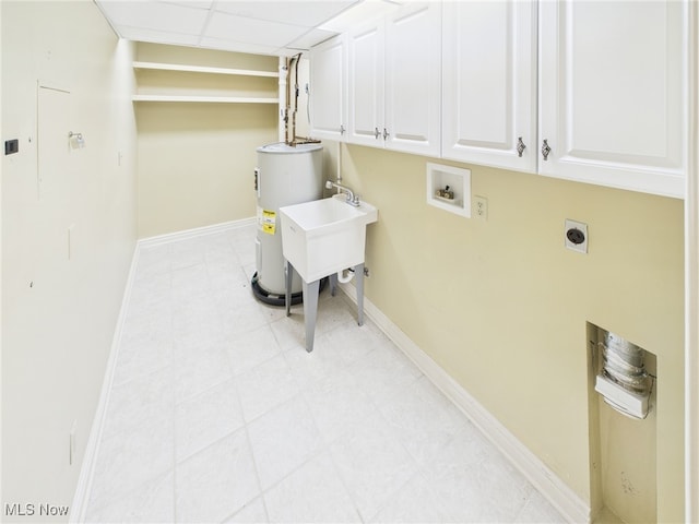 clothes washing area with baseboards, hookup for a washing machine, cabinet space, and electric dryer hookup