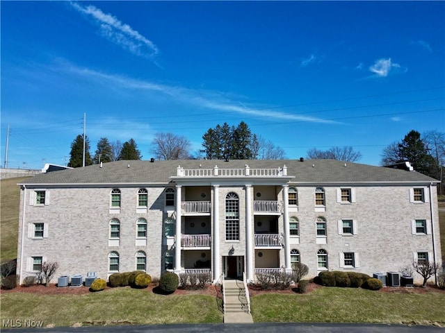 view of property featuring central air condition unit