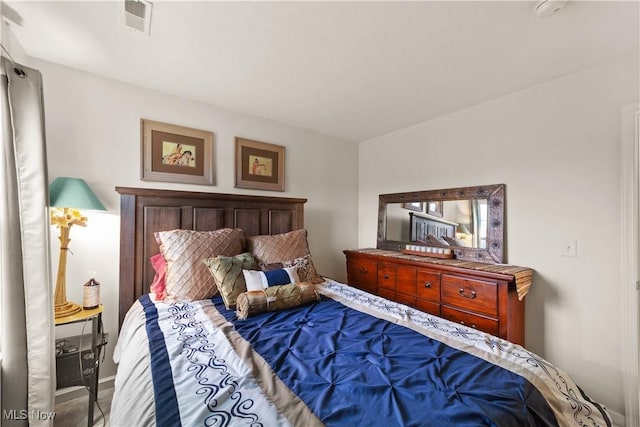 bedroom with visible vents