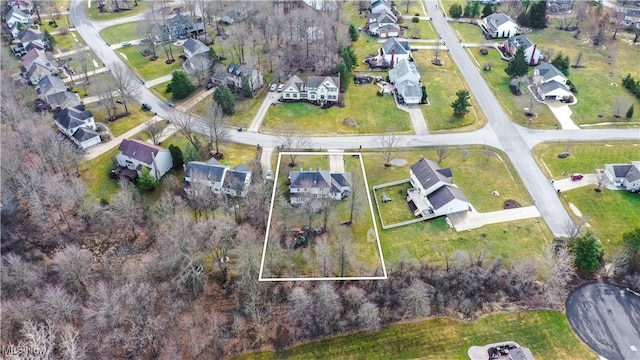 birds eye view of property with a residential view