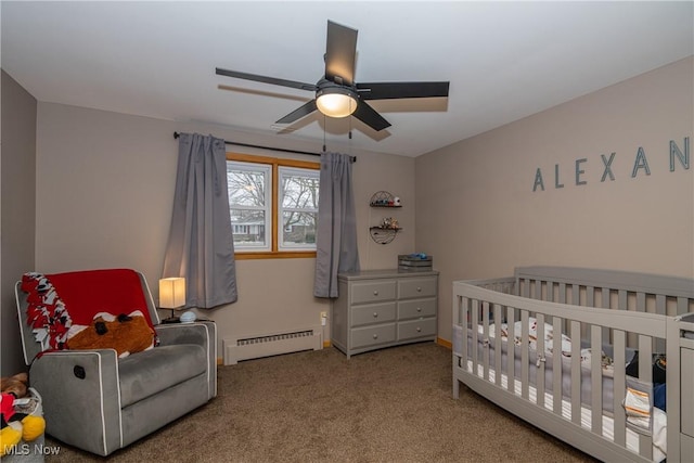 bedroom with carpet floors, ceiling fan, a baseboard heating unit, and baseboards