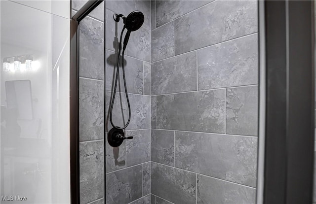 room details with a tile shower